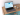 QUIQQER-News auf einem Laptop Laptop auf einem Schreibtisch mit der QUIQQER-Newsseite auf dem Bildschirm.